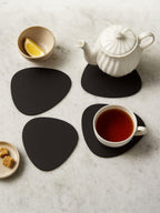 Pebble 4 Piece Black Leather Placemats | Catlins