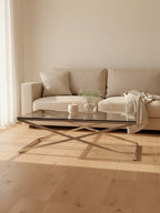 Clear Glass Top Coffee Table with Glistening Silver Stainless Steel Cross Base | Montril