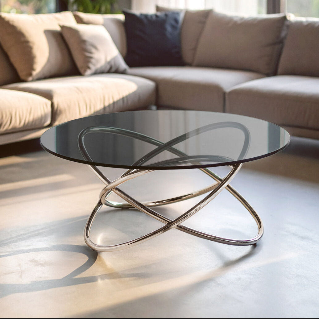 Smoked Grey Tempered Glass Top Round Coffee Table with Sculptural Stainless Steel Intertwined Base | Cassy