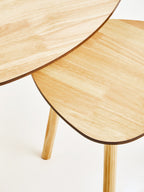 Set of 2 Natural Wooden Nesting Side Tables with Tripod Legs and Rounded Triangle Tops | Rostok