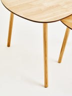 Set of 2 Natural Wooden Nesting Side Tables with Tripod Legs and Rounded Triangle Tops | Rostok