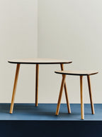 Set of 2 Natural Wooden Nesting Side Tables with Tripod Legs and Rounded Triangle Tops | Rostok