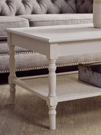 White Wooden Coffee Table with Cane Webbed Lower Shelf and Carved Spindle Legs | Heritage