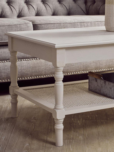 White Wooden Coffee Table with Cane Webbed Lower Shelf and Carved Spindle Legs | Heritage