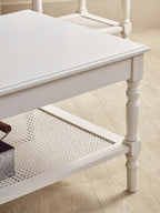 White Wooden Coffee Table with Cane Webbed Lower Shelf and Carved Spindle Legs | Heritage