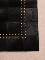Bosie Small Black Hair on Leather Patchwork Rug with Gold Studs | Safira
