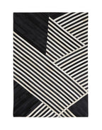 Bosie Small Black and White Hair on Leather Rug | Safira