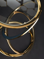 Gold Finish Rings Shaped Base End Table with Clear Glass Top | Oria