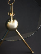 Clear Glass Top Side Table with Gold Tripod Metal Frame and Globe Detail | Oria