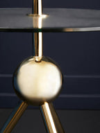 Clear Glass Top Side Table with Gold Tripod Metal Frame and Globe Detail | Oria