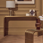 Matte Gold Slatted Console Table with Clear Glass Top | Vogue