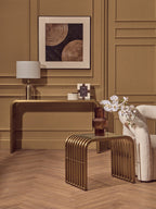Matte Gold Slatted Console Table with Clear Glass Top | Vogue
