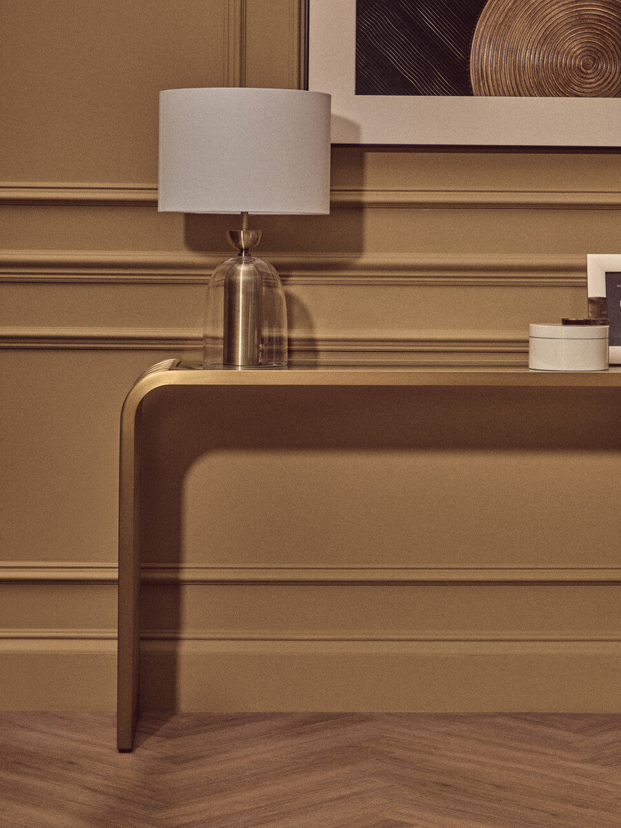 Matte Gold Slatted Console Table with Clear Glass Top | Vogue