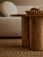 Natural Mango Wood Coffee Table with Column Base and Rounded Top | Walsa
